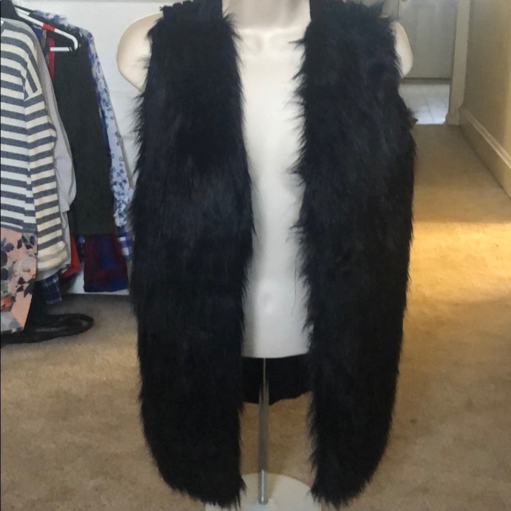 Faux fur vest with knit back